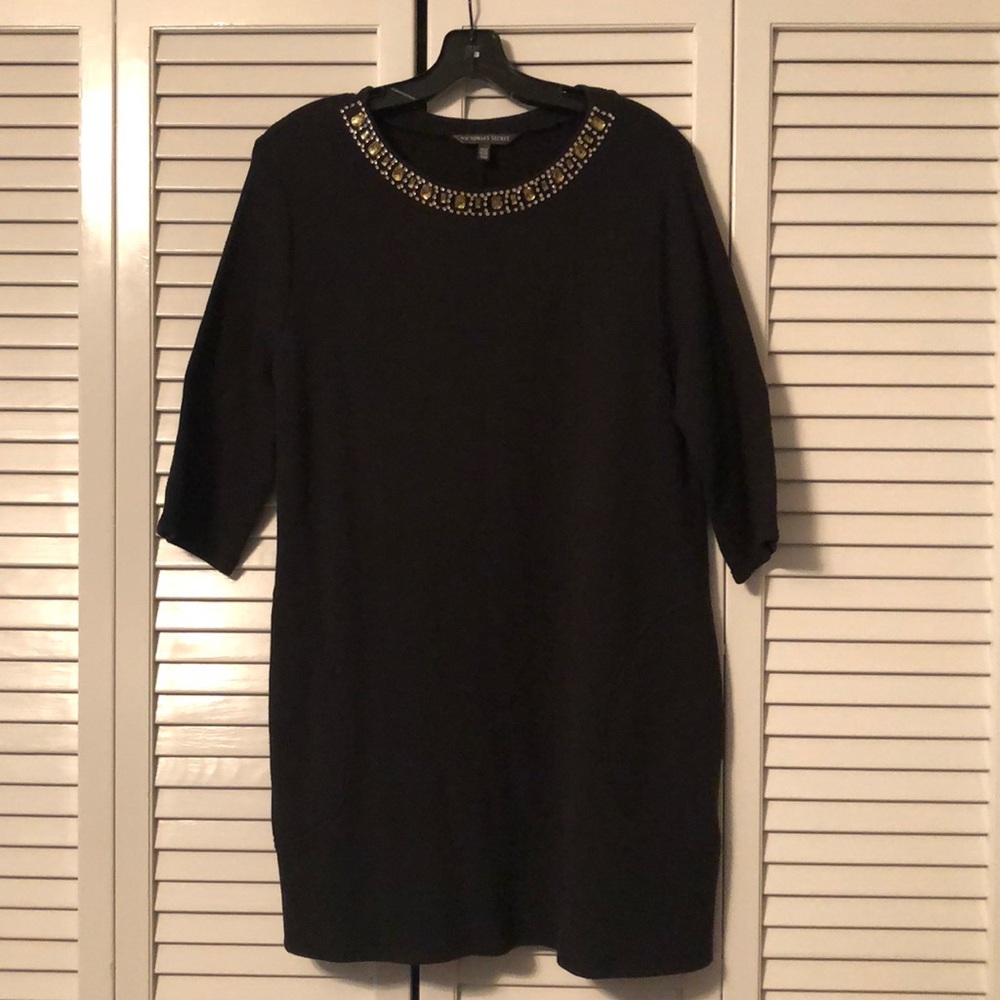 Black knit dress with jeweled neckline